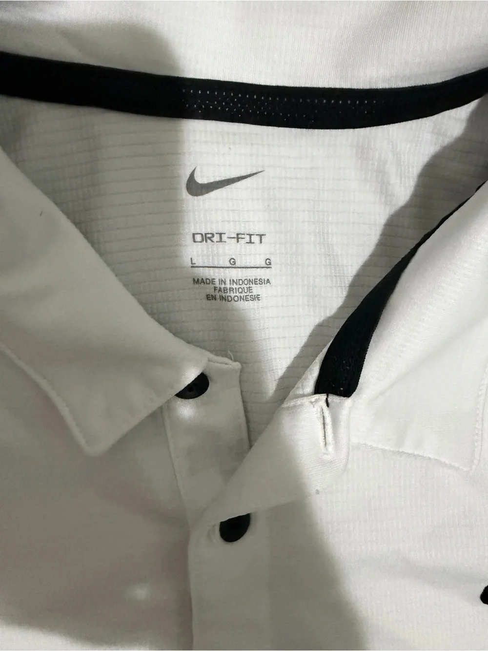 Nike White Polo Shirt with Black Swoosh